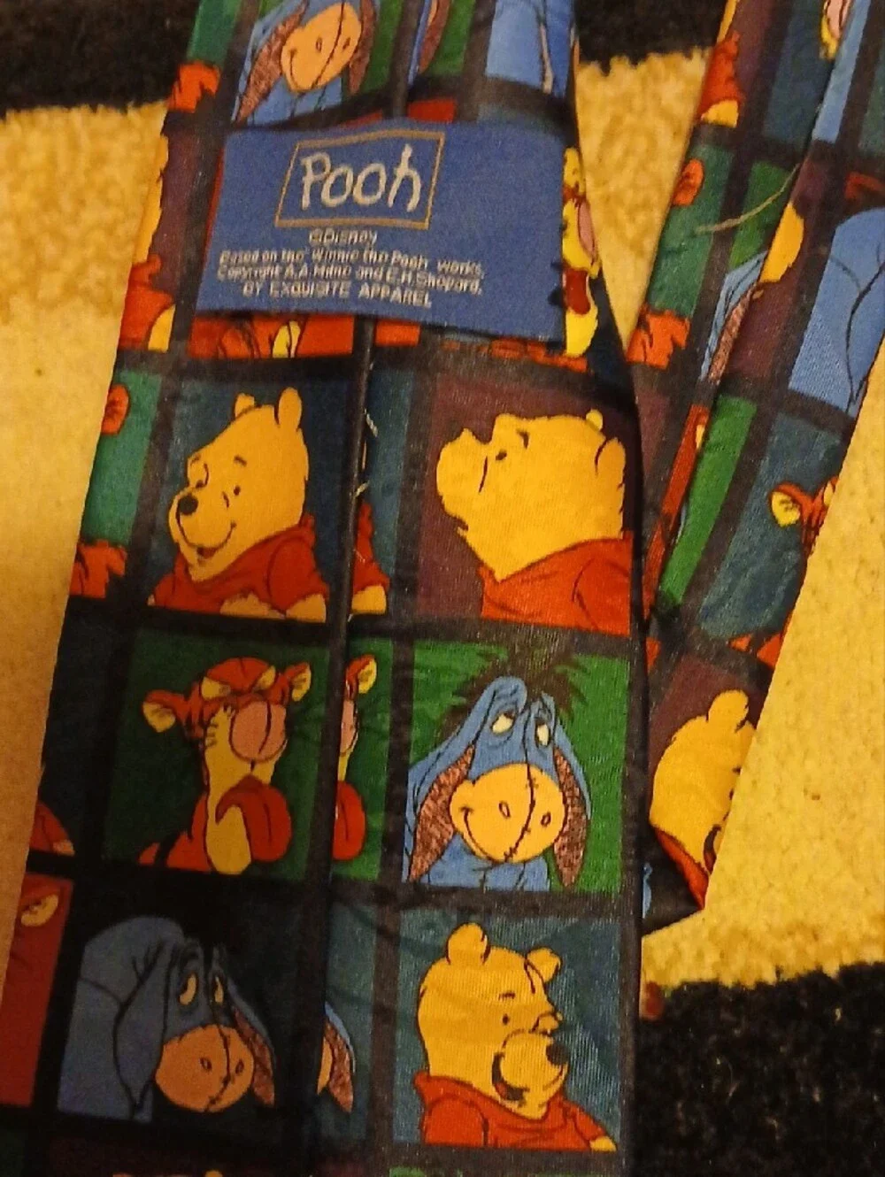 Disney Winnie the Pooh Character Grid Tie in Blue, Yellow, Red, Green